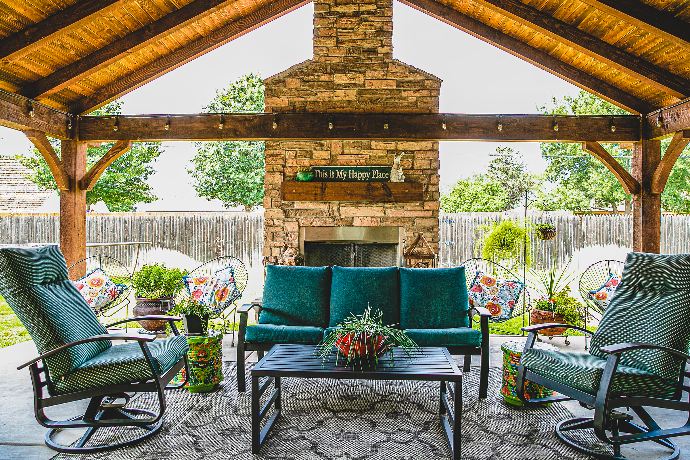 Custom stone fireplace with pergola